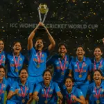 Indian women’s cricket team celebrating ICC World Cup 2025 victory with trophy and confetti